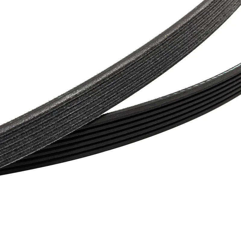 How resistant are EPDM raw edge V-belts to chemicals and oils commonly found in automotive environments?